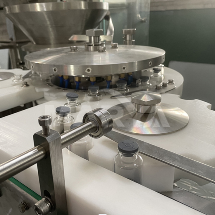 vial stoppering machine remplissage